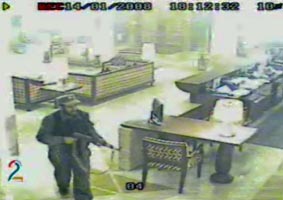 An armed attacker in the lobby of the Serena Hotel in Kabul, Afghanistan, on January 14, 2008. 